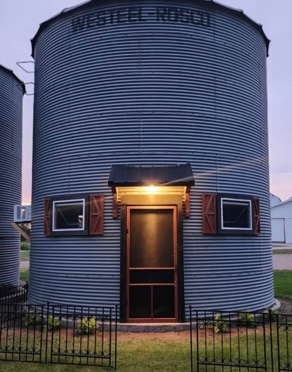 Grain bin groom suite exterior evening